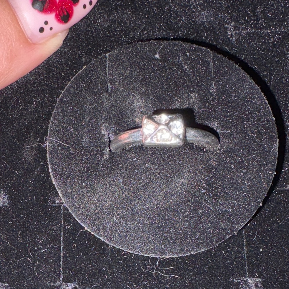 Elegant Silver Ring with Diamond Accents